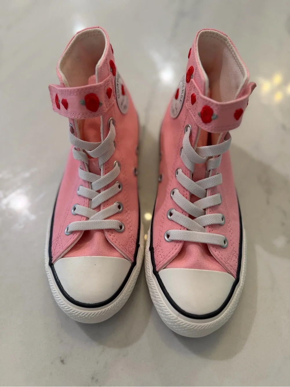 Converse Pink High-Top Sneakers with Red Heart Details